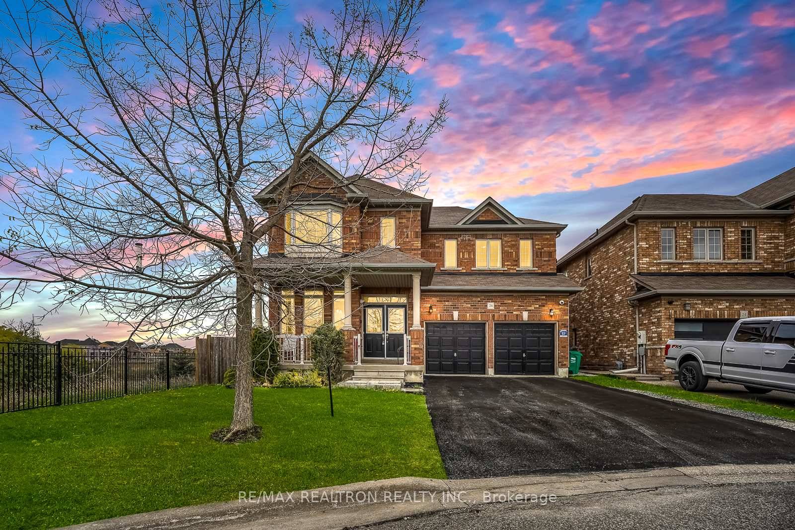 Executive 4 bedroom home on premium lot overlooking water and open space with no neighbour on one side of the property !