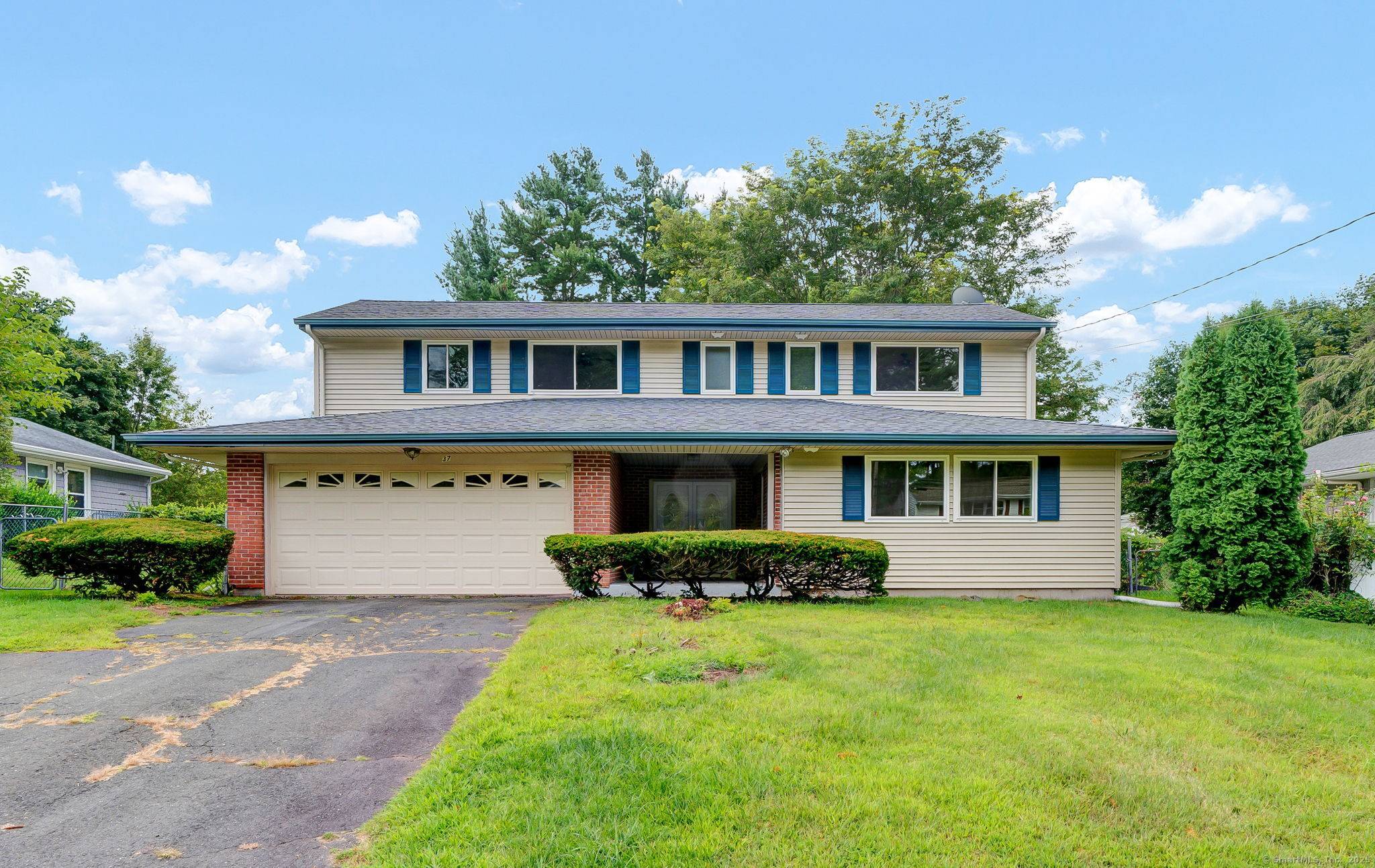 Welcome to this beautifully maintained Split Level residence in one of West Hartford's most desirable neighborhoods.