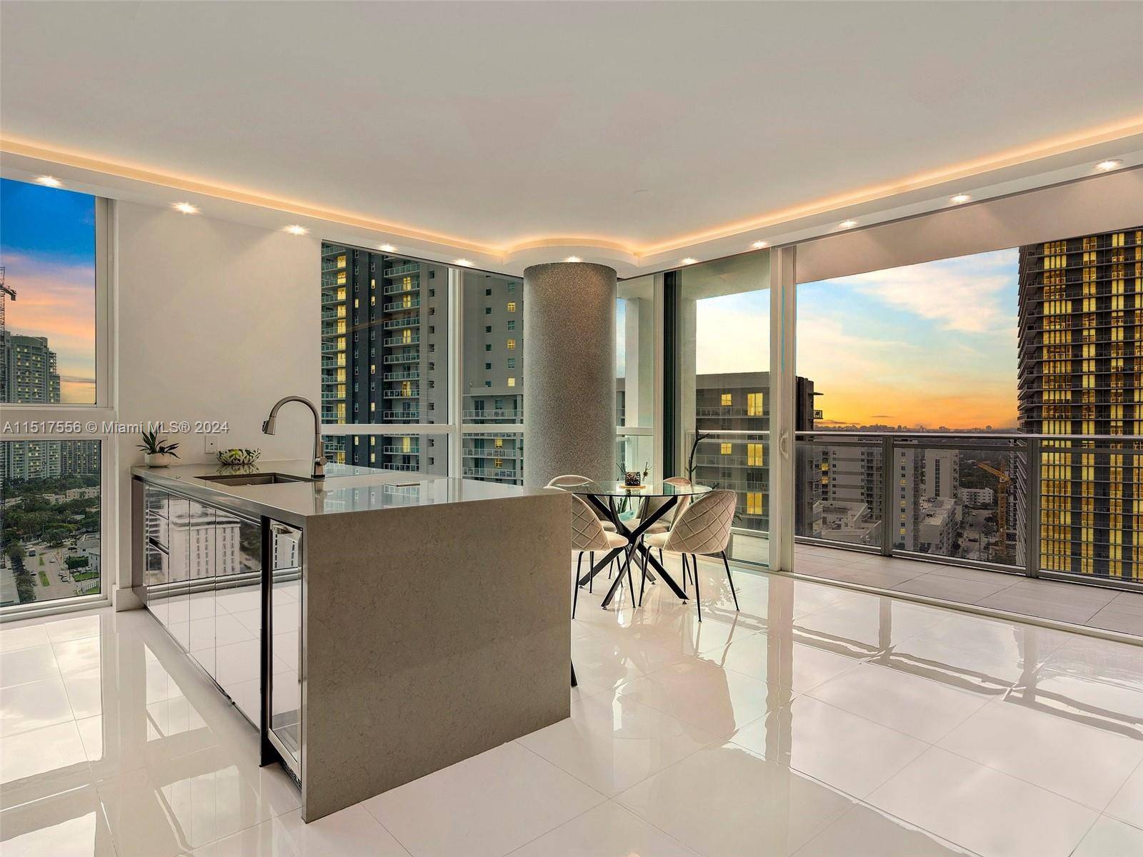 Enjoy stunning Bay views and Miami sunsets from this corner 2 bed, 2 bath fully furnished unit at The Bond on Brickell.