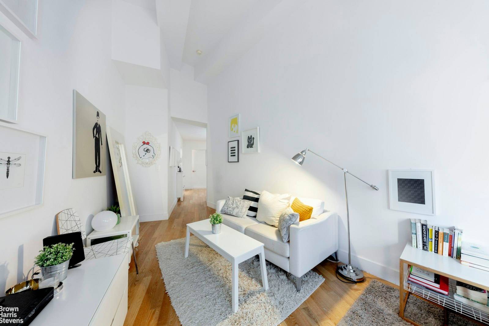 ULTRA HIGH 13' CEILINGS AND MASSIVE WINDOWS are the hallmarks of this sun flooded, oversized Alcove Studio Sleeping, Dining, or Home Office Alcove at 99 John Deco Lofts Perfect for ...