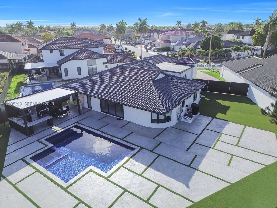 Exceptional 6 bedroom, 4 bathroom home offering more living space than the tax roll, plus an office den, storage room, and 1 car garage, all situated on an oversized 10, ...