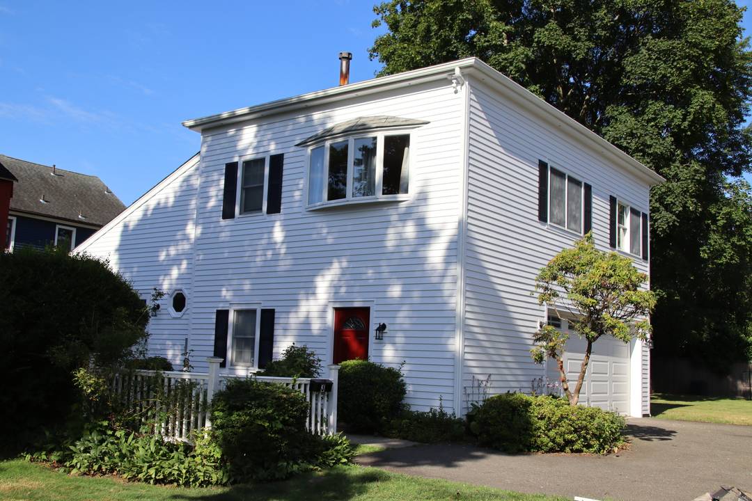 Live in the heart of downtown Milford in this beautifully remodeled single family home just steps from the Milford Green, train station, top rated restaurants, bars, and the marina.