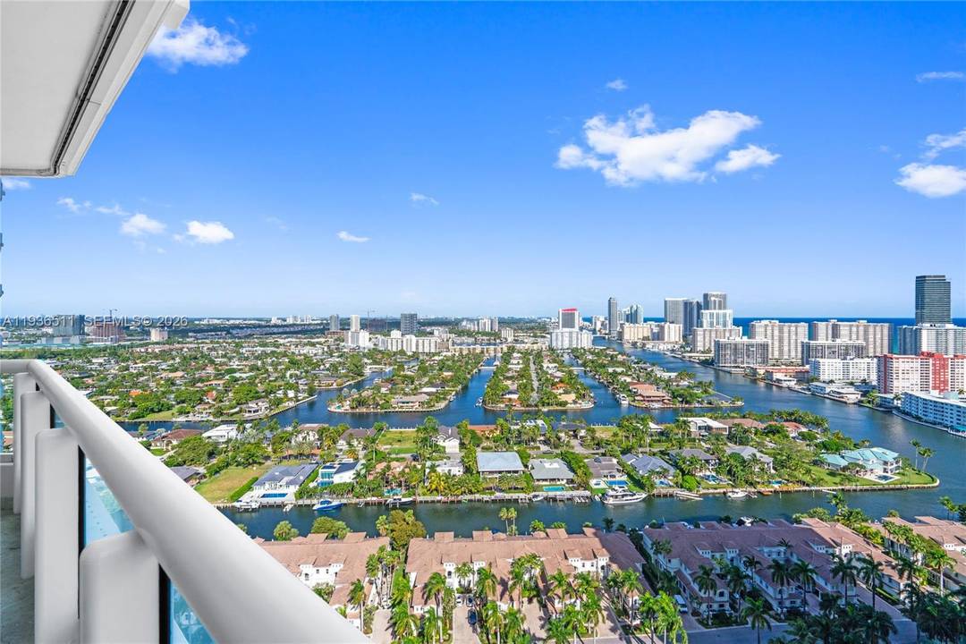High floor residence with northeast exposure and panoramic ocean, intracoastal, and city views.