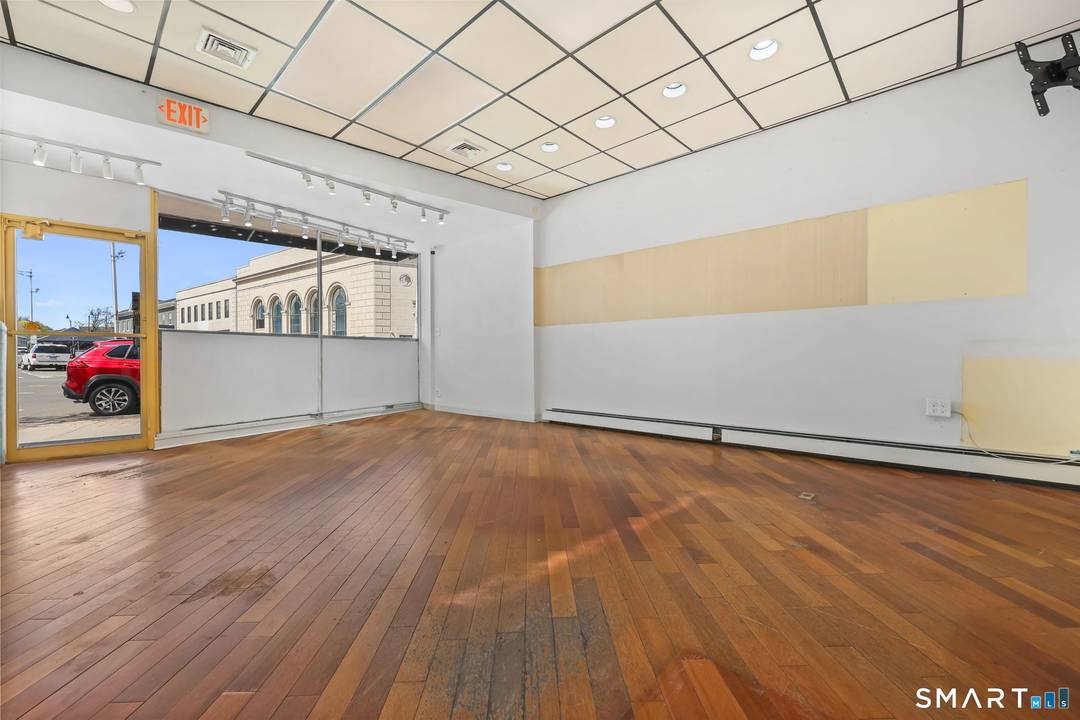 Rare Wall Street Opportunity Mixed Use Brick Storefront.