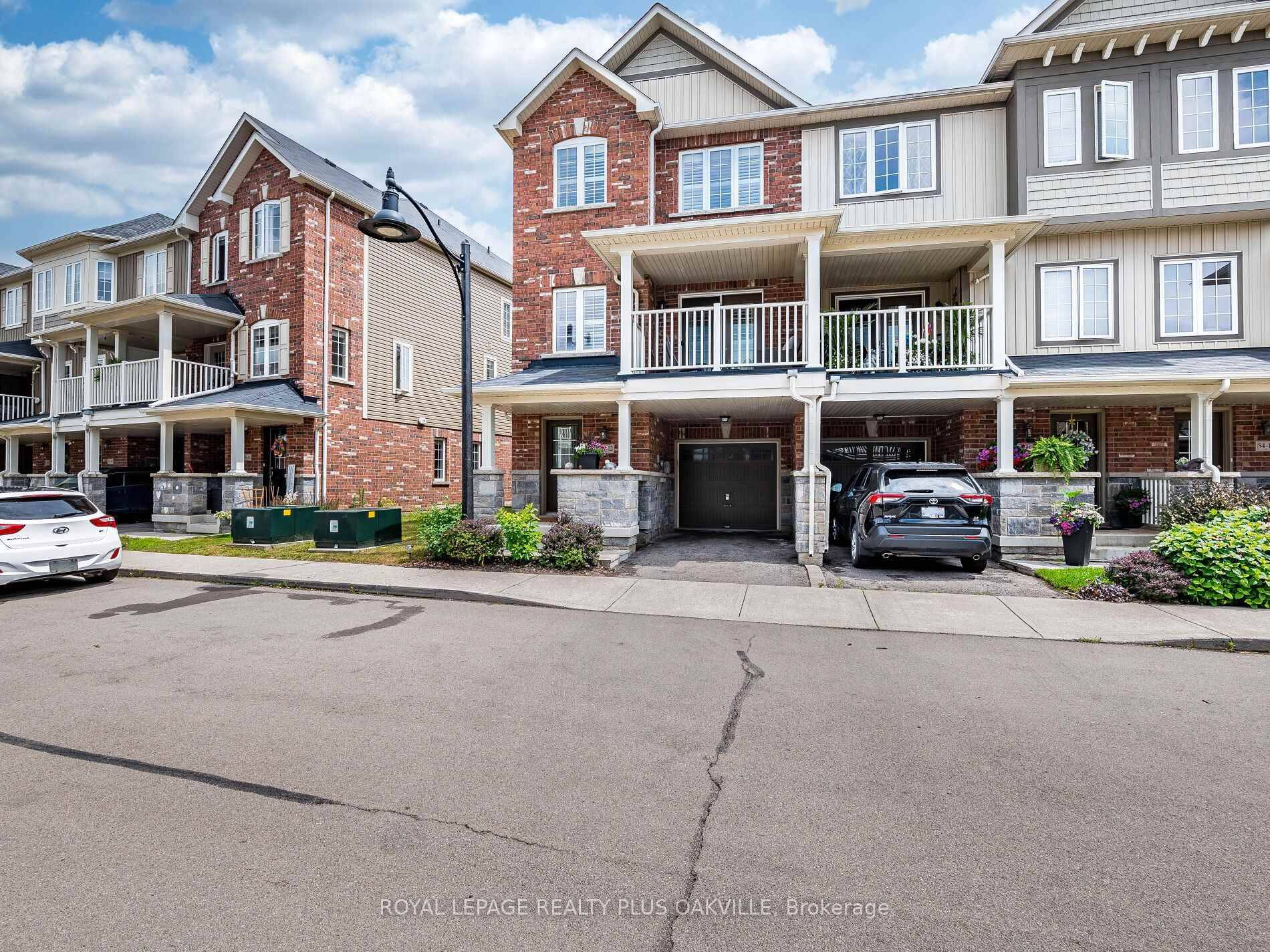 Welcome To This Stunning 3 Story Townhome Located In The Charming Community Of Waterdown.