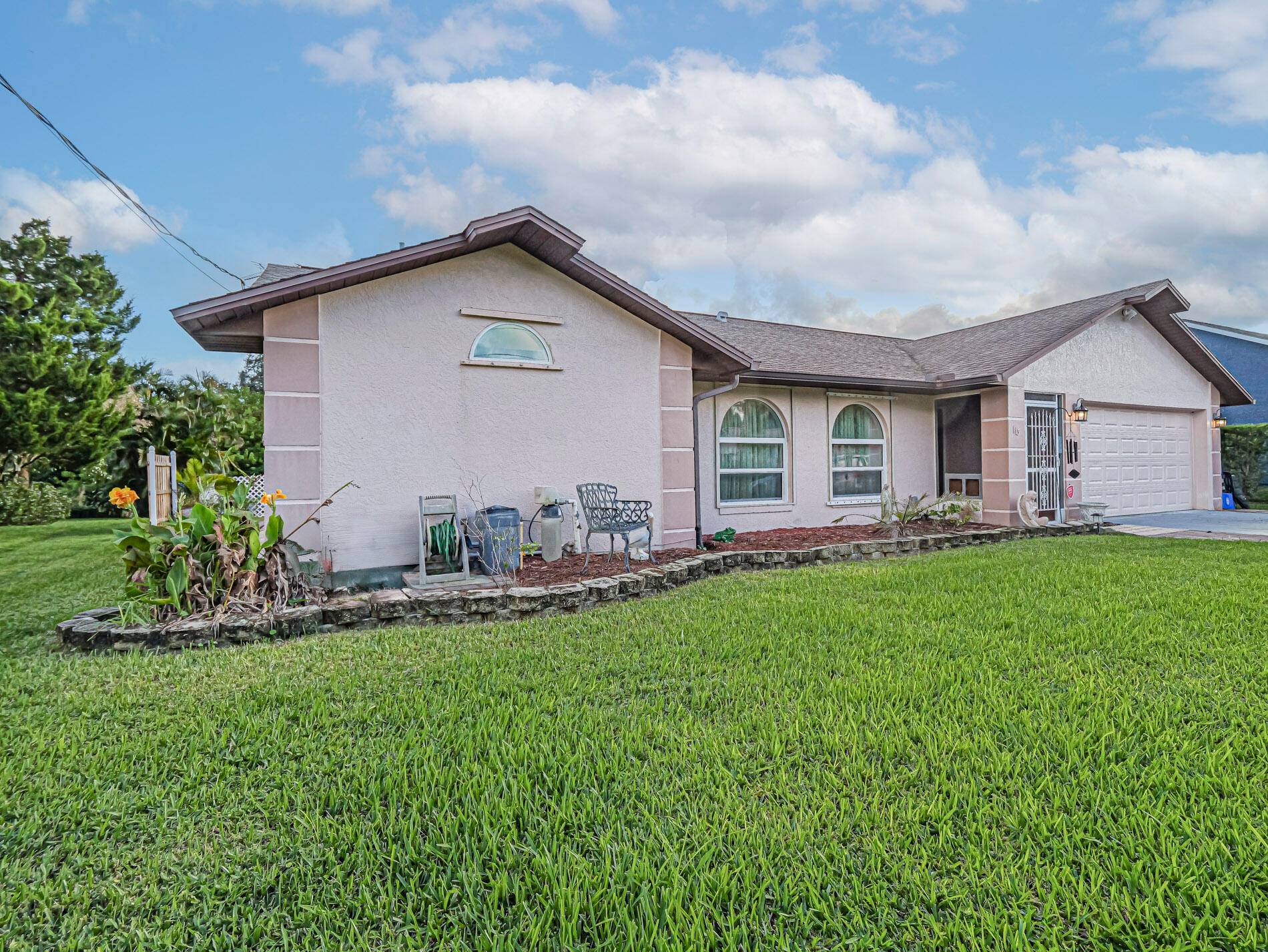 Located in Sebastian Highlands, spacious ranch featuring vaulted ceiling in living room dining room, tiled floors, updated kitchen with attached sitting area and family room.