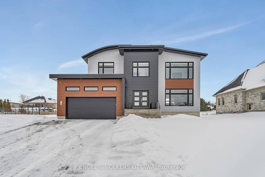 Welcome to this exceptional custom built, automated home, crafted with precision and modern elegance.