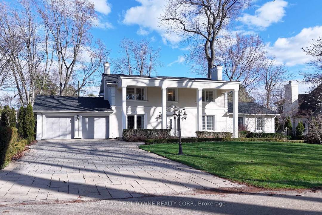 Set on a premium 102 x 154 ft lot just steps from Gairloch Gardens and Lake Ontario, this elegant Colonial residence at 1316 Cambridge Dr offers over 5, 000 sq.