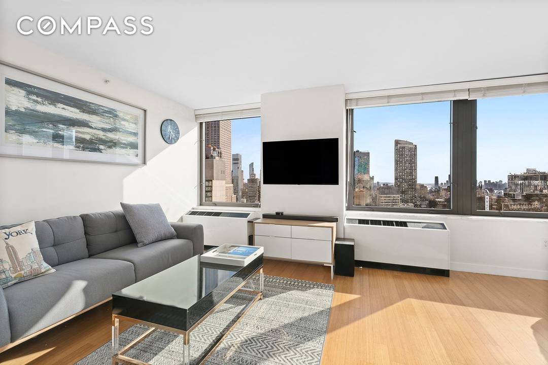 Sun Drenched Alcove Studio with Iconic Skyline Views at the Coveted Bryant Park Tower Condominium.