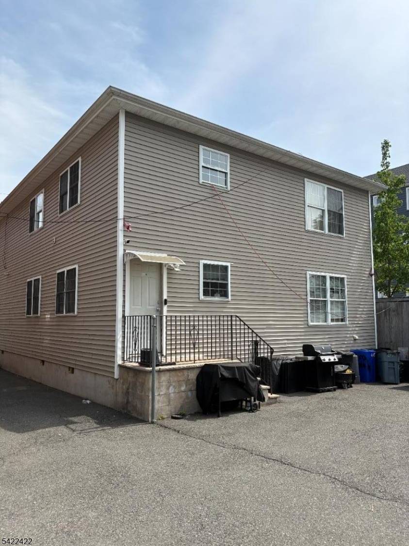 Wow ! ! Newer 2 Family 2006 with generous sized rooms.