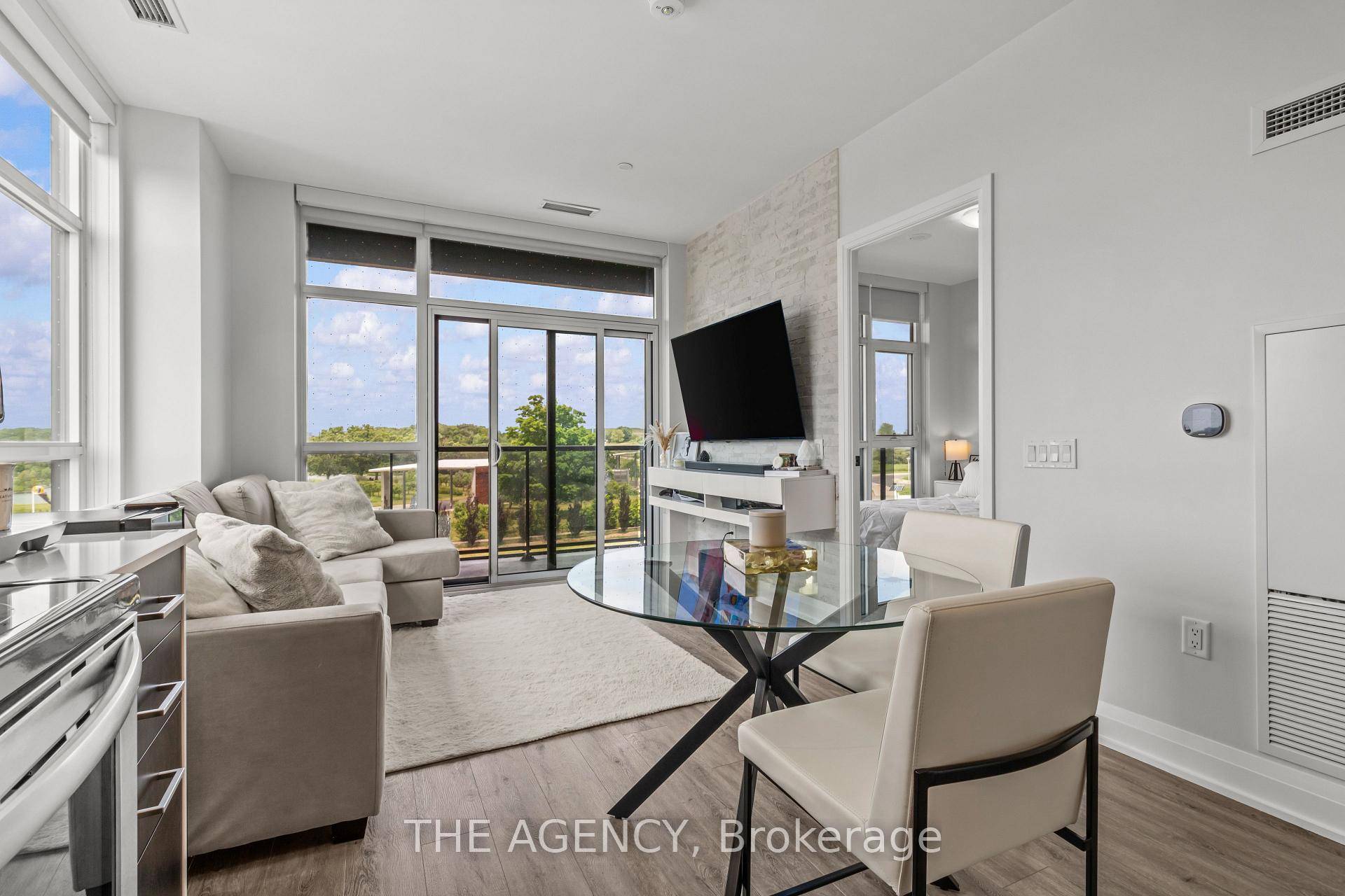 Welcome to Suite 213 at 60 George Butchart Drive where luxury living meets the vibrant heart of Downsview Park.