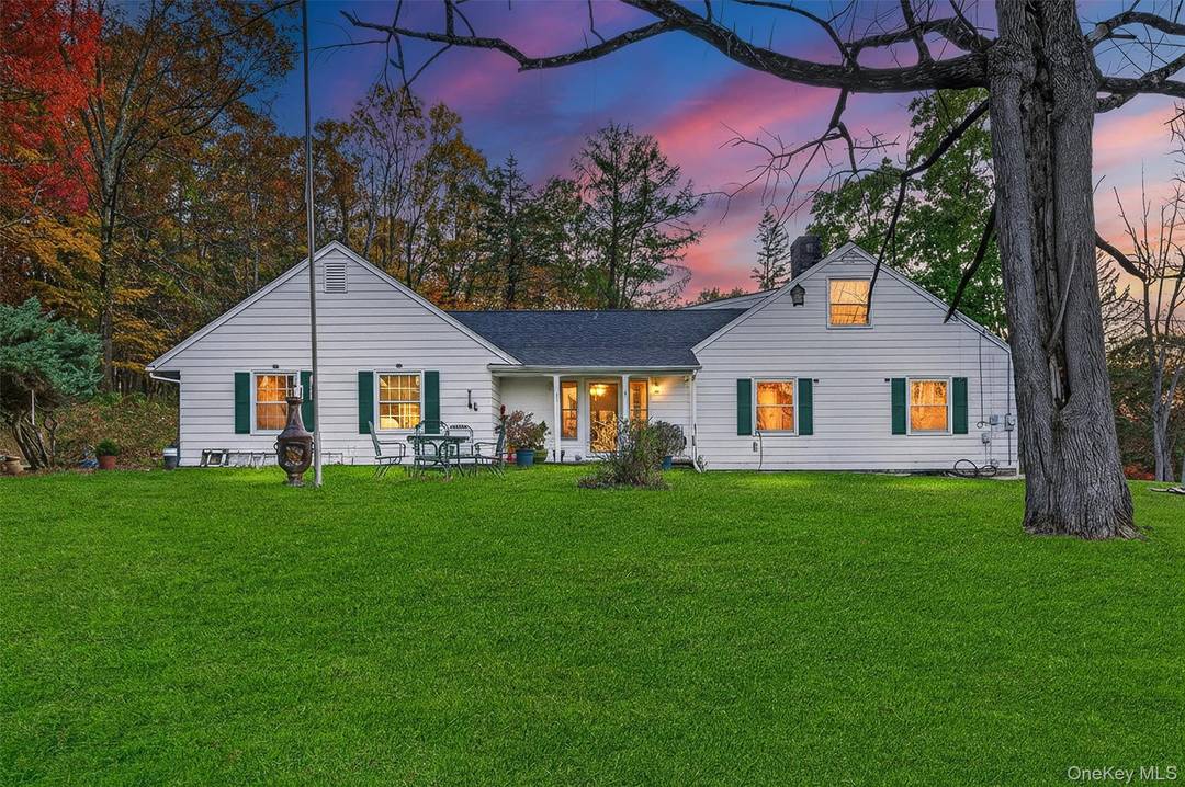 This stunning contemporary Cape Cod offer's nearly 5, 000 Sqft of living space on 2.