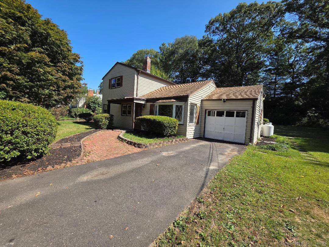 Charming Trumbull Home with Spacious Yard and Deck.