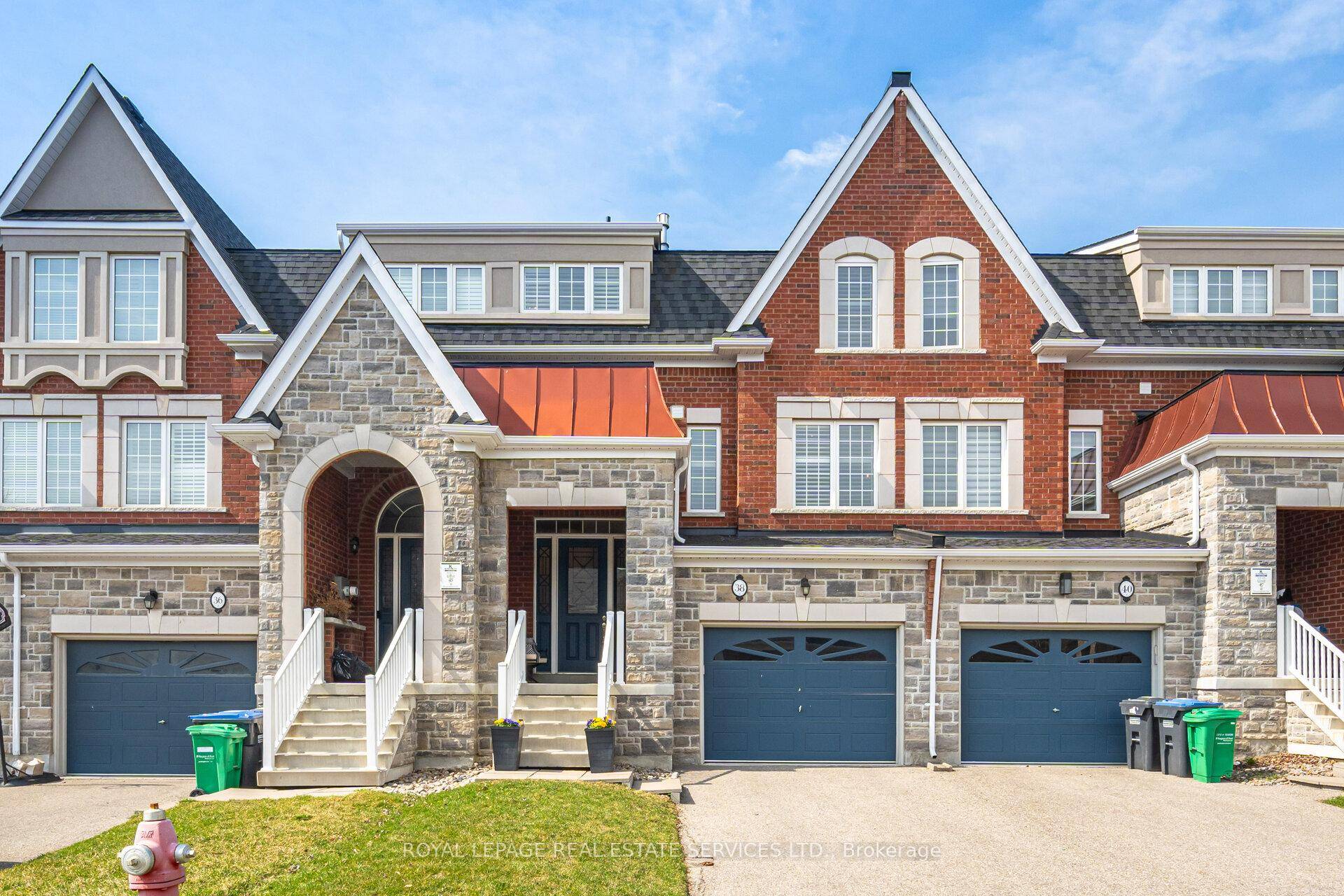 Stunning Executive Townhome with Charming Entryway and Soaring 16 Ft Ceilings, Bright and Spacious with Many Quality Builder Upgrades.