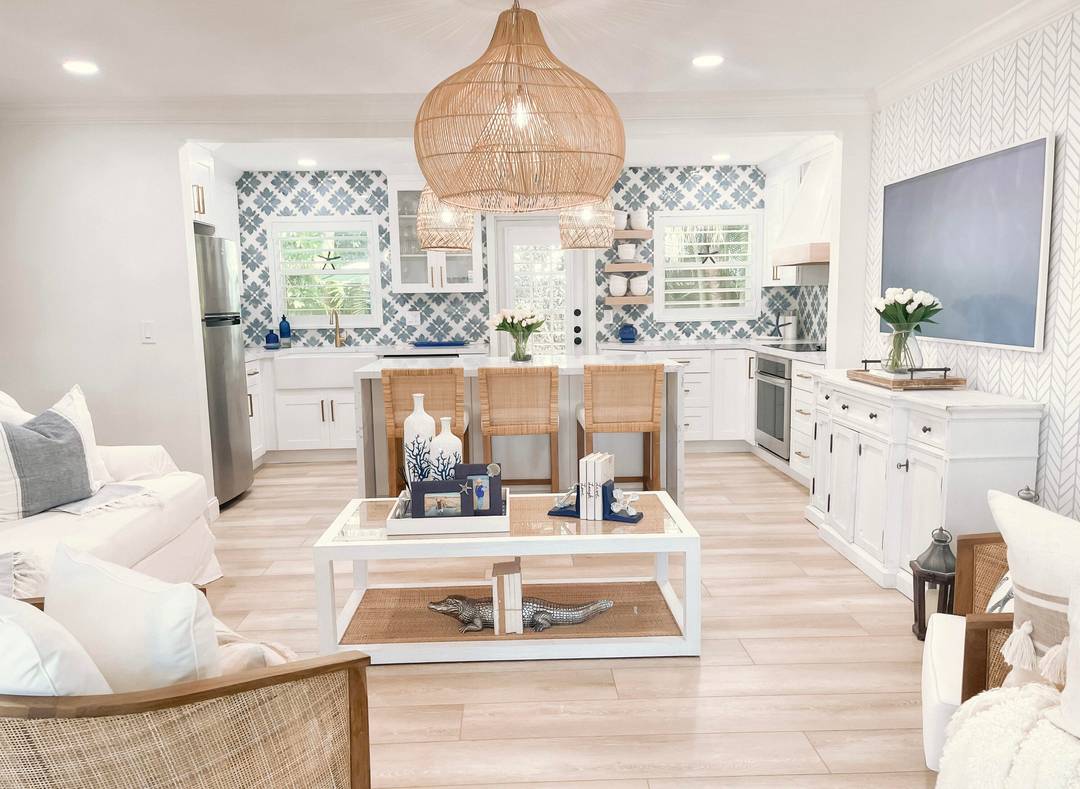 Escape to coastal bliss in this beautifully remodeled beach cottage, just steps from the sand and surf.