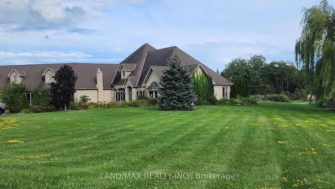 Discover The Epitome Of Luxury Living On This Expansive Estate With This Immaculate 4 Bdrm Bungalow, Boasting Over 4, 400 Sq Ft Of Expertly Designed Custom Built Elegance.