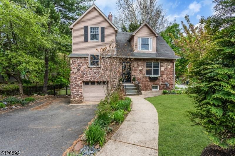 Charm, character, and peaceful living with spectacular views and low taxes, highly sought after Roseland !