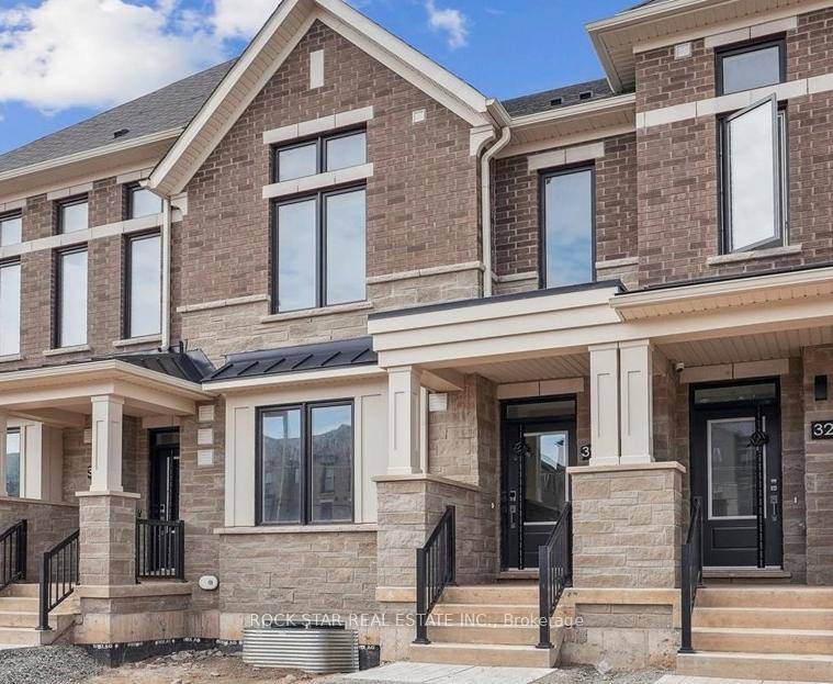 This brand new, never lived in freehold townhome stands out with a double car garage plus two additional covered spots under the porch offering rare, demo home style parking flexibility ...