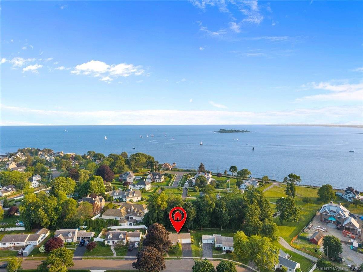 Welcome to 60 Ranch Road a bright coastal retreat with room to grow.