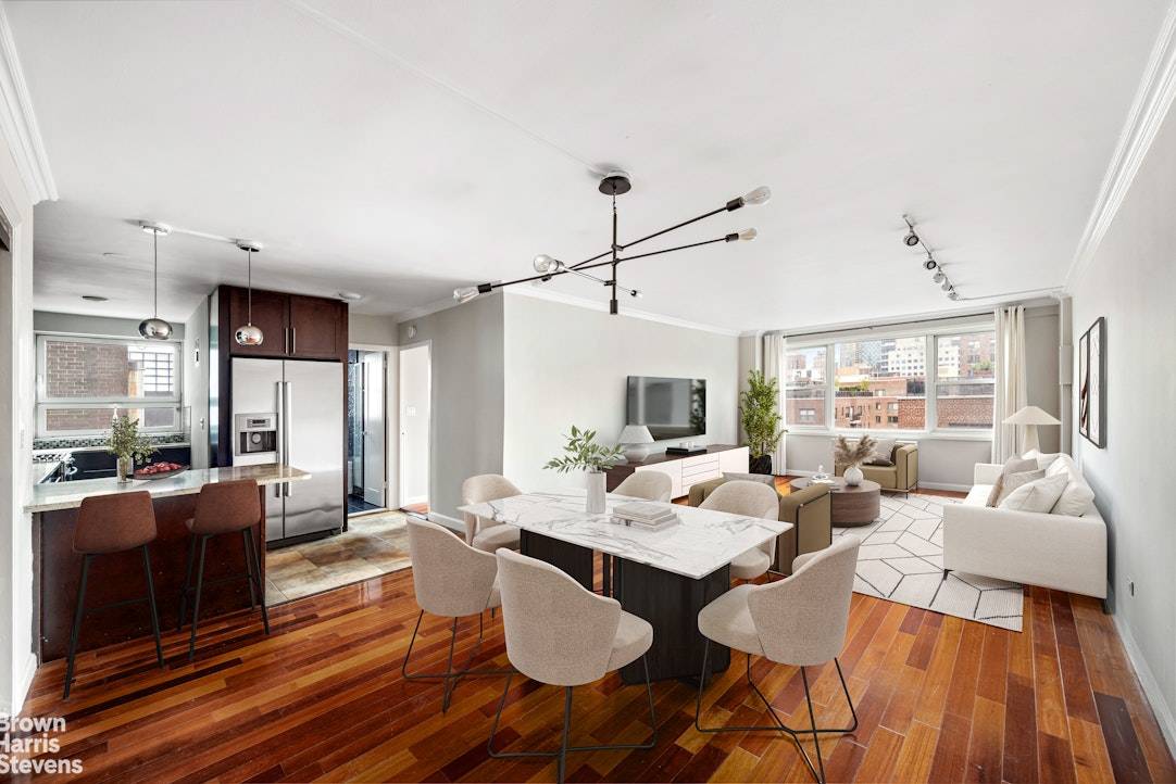 This light filled, oversized one bedroom, one bathroom home offers open northern and western exposures with wide city views in a full service building in the heart of Lenox Hill.