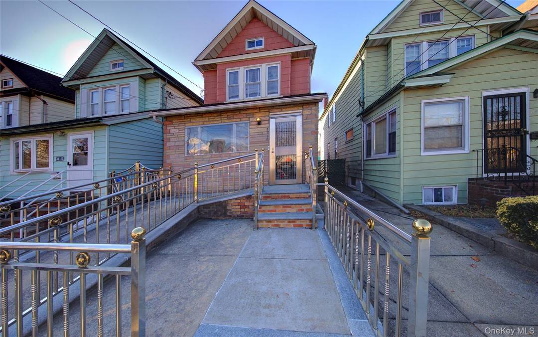 Rare Opportunity in Richmond Hill Two Family Home With Exceptional Potential.