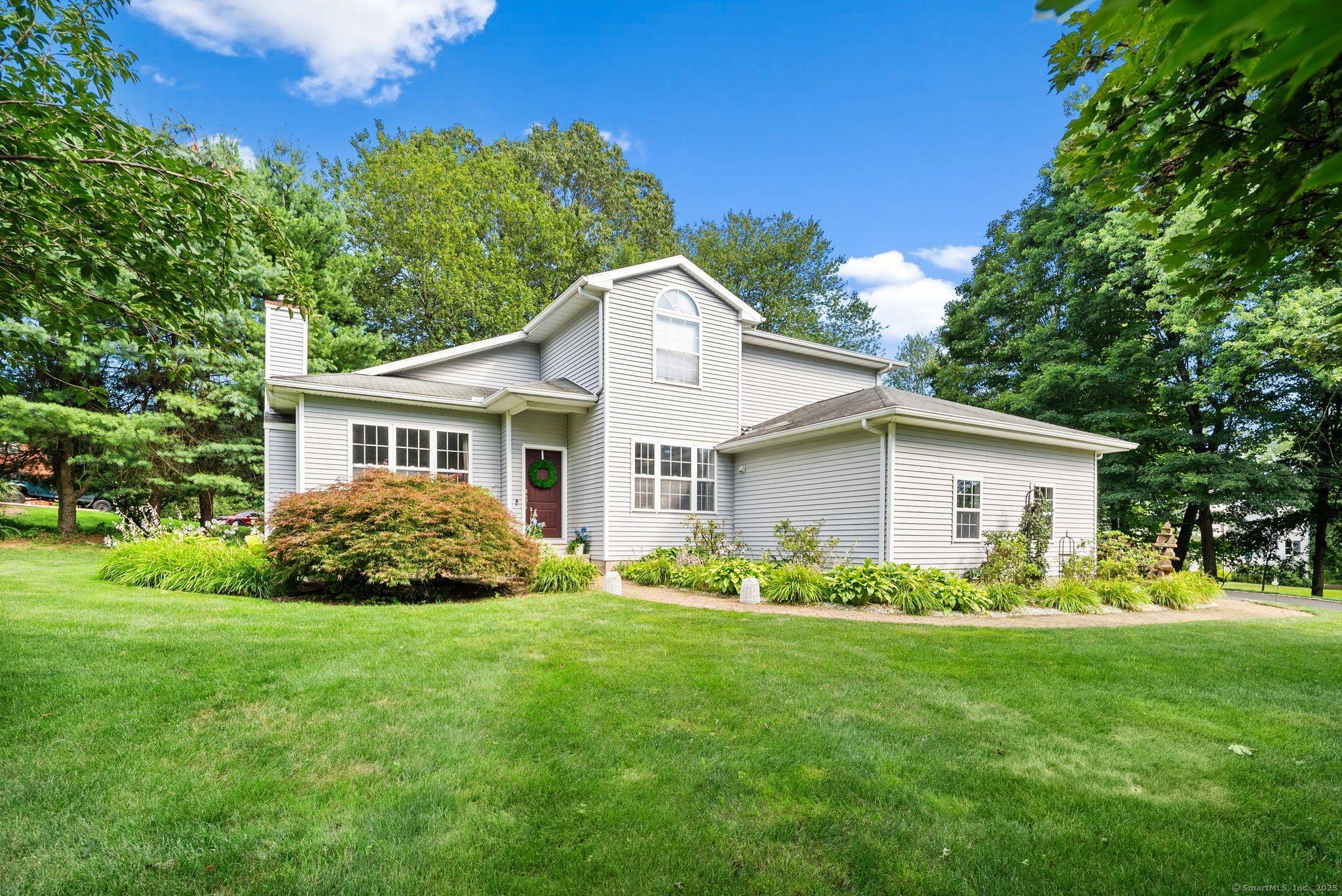 Welcome to 6 Aspen Rise in East Granby, where comfort meets sophistication.