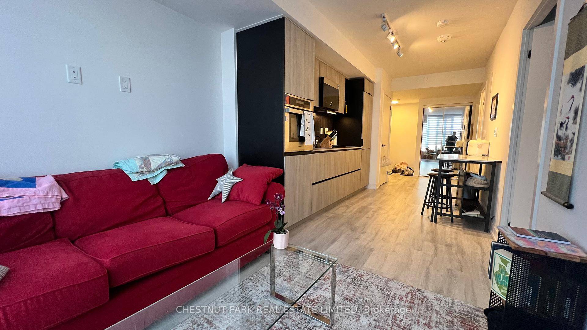 Welcome to this modern 586 sq ft unit featuring 1 bedroom a functional den with sliding door, perfect for a home office or second bedroom, and 2 bathrooms, both with ...