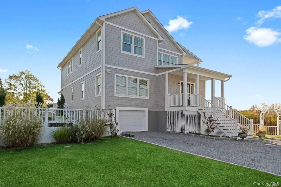 Enjoy beautiful bay views from this recently constructed home close to the Village of Westhampton Beach, Dune Road beaches, and marina.