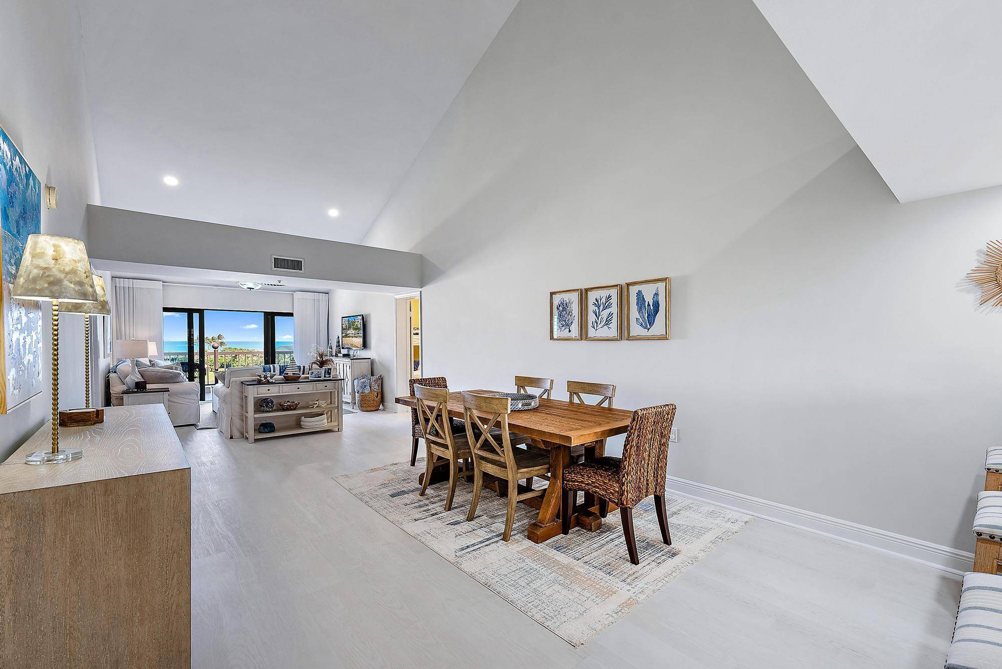 Breathe in the sparkling, Bahama blue, ocean views from this stunning penthouse with soaring, 20 foot cathedral ceilings.