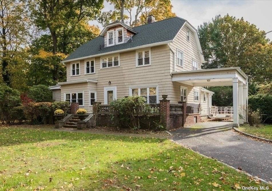 Set back on an acre of flat, private, beautiful property, this majestic, 7 bedroom, 3 bath Center Hall Colonial, built in 1914, is a charming and spacious home with 10 ...