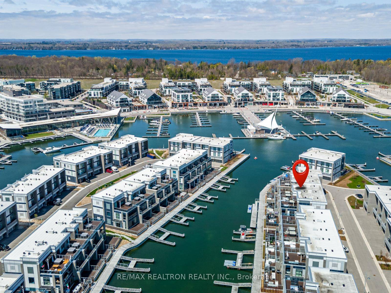 Discover the epitome of waterfront luxury with this stunning 4 bedroom, 5 bathroom townhome on the highly sought after West Island at The Harbour.