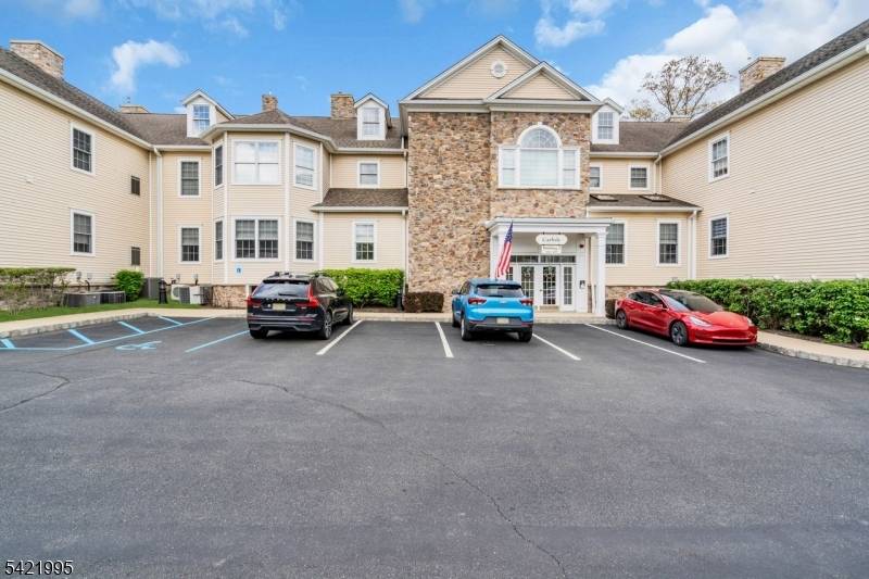 No steps. Spacious, 2 BR end unit, newer construction 2008 with modern, open floor plan.