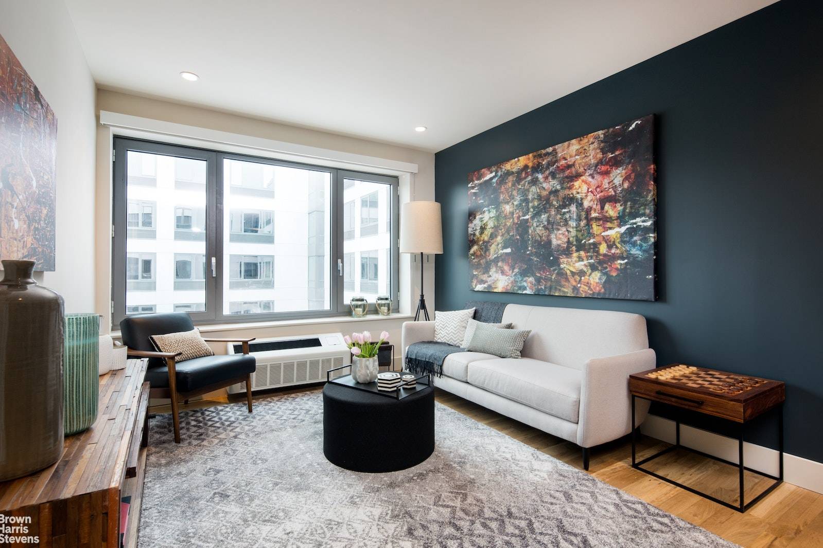 302 is a lovely south west facing one bedroom home that features a modern kitchen with stainless steel appliances, hardwood floors and in unit Bosch Washer amp ; Dryer.