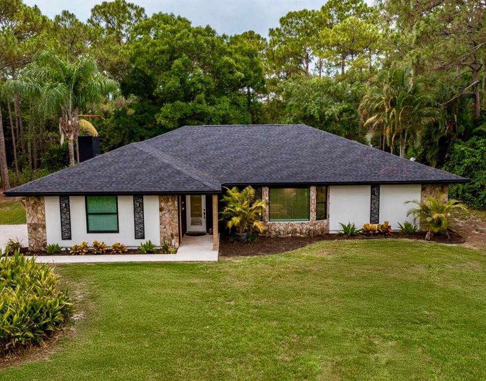 Welcome to your 3 2 Jupiter Farms home on over 1.