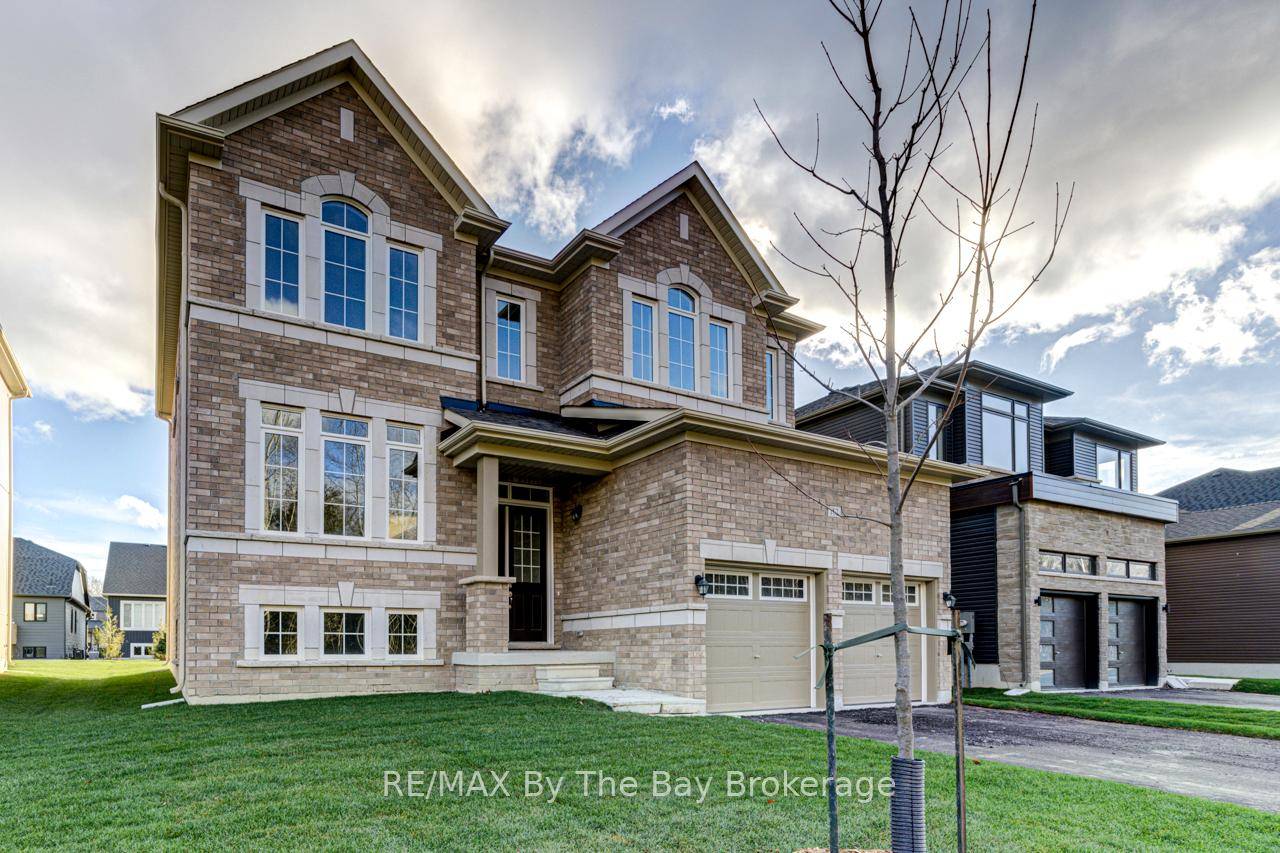 All brick 2, 457 sq ft 2 story built by Zancor Homes.