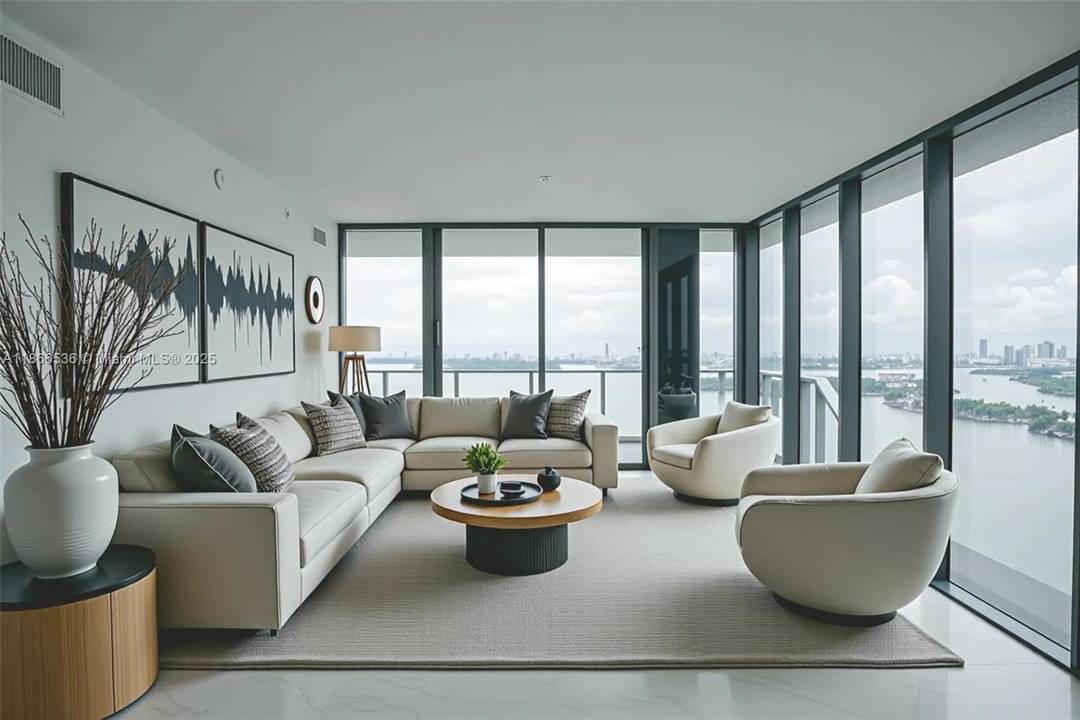 Experience elevated living from the 55th floor of Aria Reserve, where panoramic, unobstructed water views stretch endlessly across Biscayne Bay.