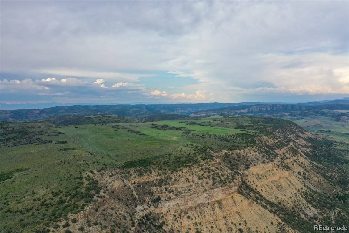 Introducing an expansive ranch spanning over 1680 acres and conveniently located just 15 minutes south of Craig, Colorado.