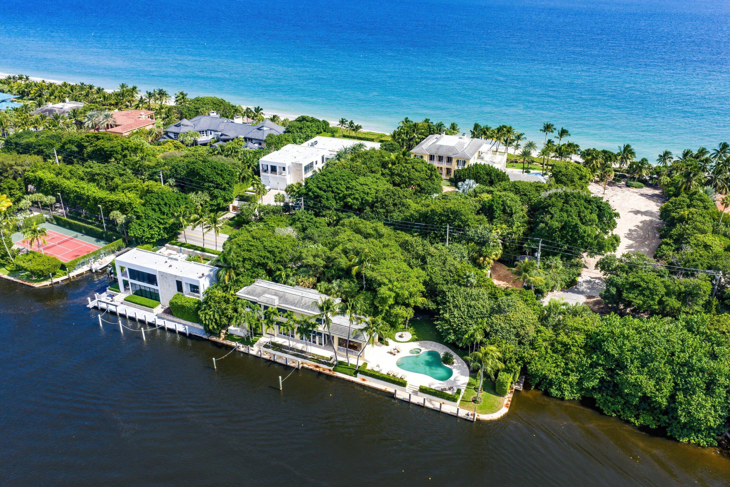 This gated estate is perfectly positioned on over two acres of prized Ocean to Intracoastal property along prestigious Hillsboro Mile.