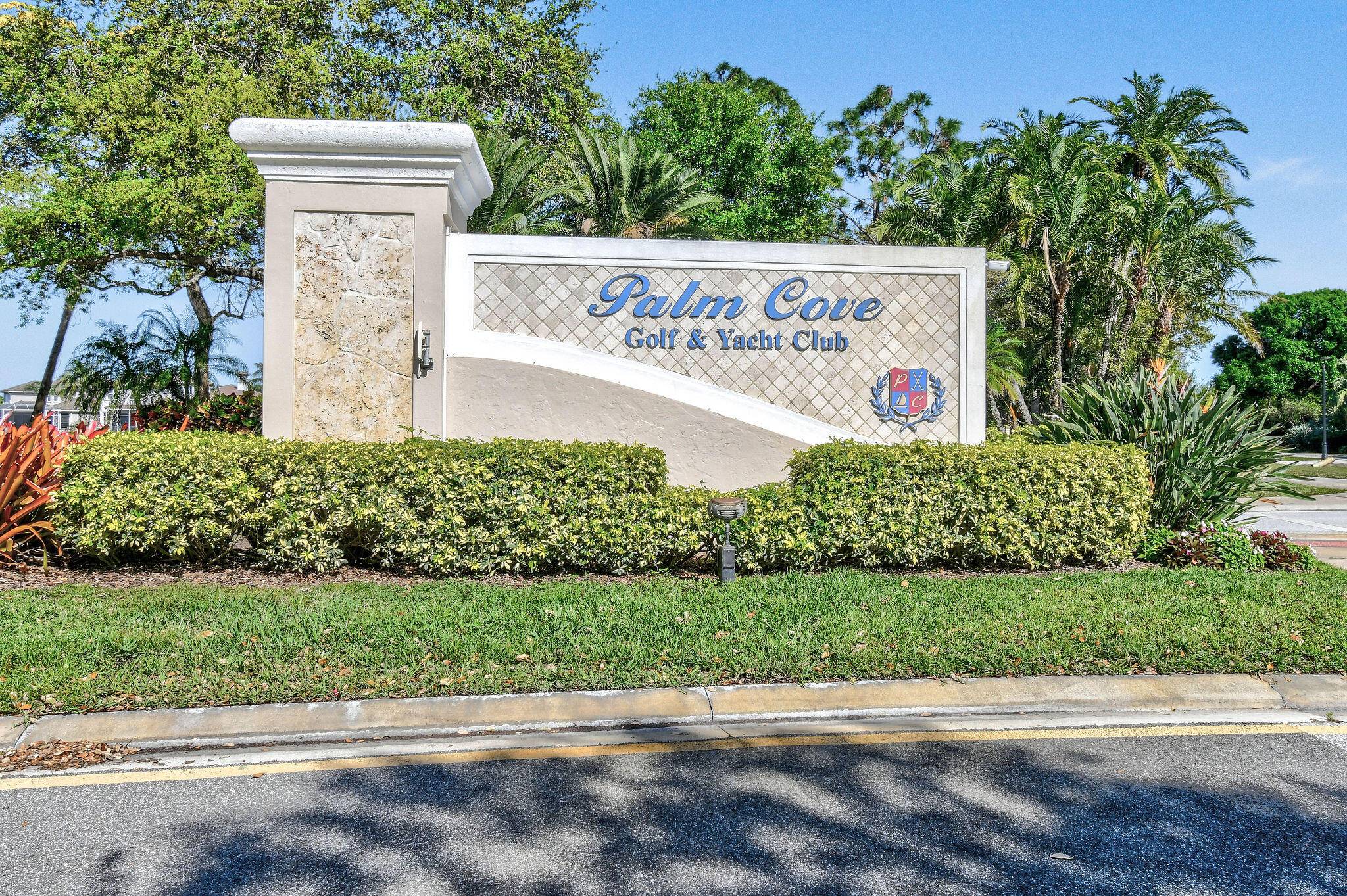Discover luxury living at it's finest in the prestigious highly sought after Palm Cove Golf Yacht Club.