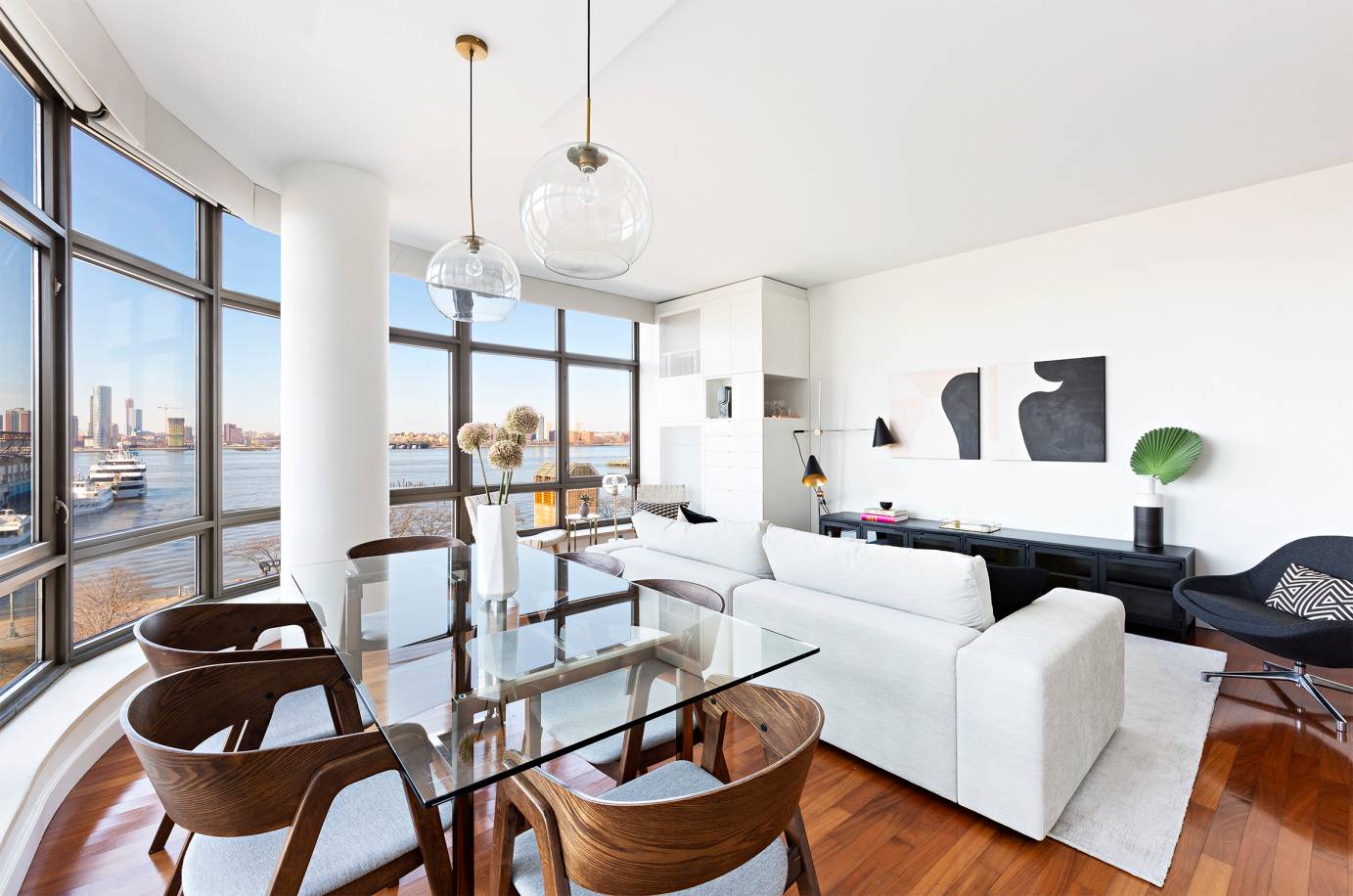 Serene, Stylish and Sexy Savor direct Western views of the Hudson River and park from the living room of this elegant, oversized condo designed by Andres Escobar.
