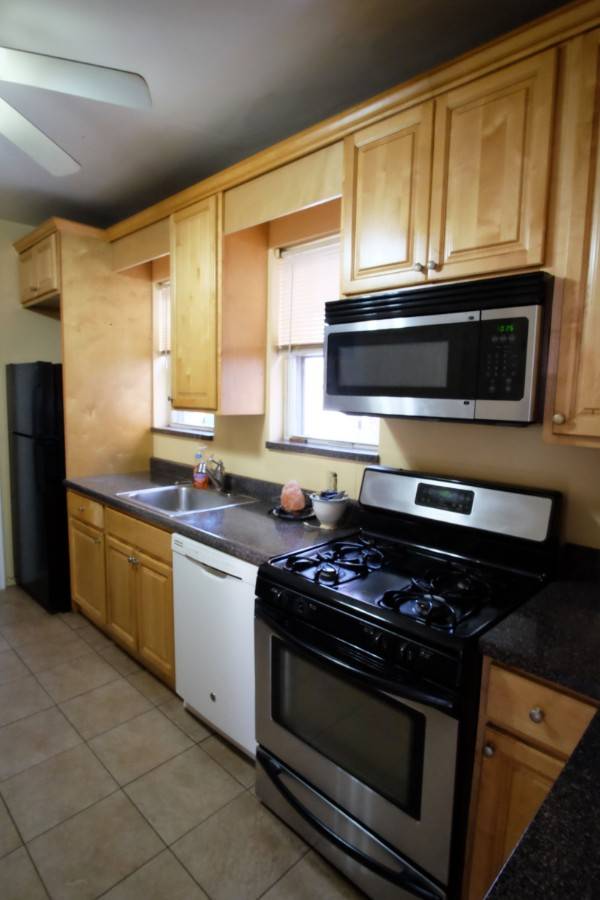 This spacious home and empty lot come as a package deal, it is a great investment opportunity.