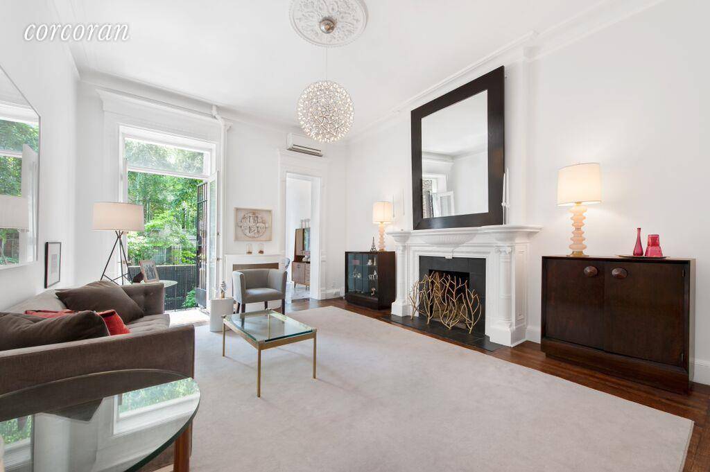 Welcome home to boutique townhouse living with 3 levels of elegance and full basement, 5 fireplaces, 4 bedrooms, 4 full baths and formal library that can easily accommodate a 5th ...