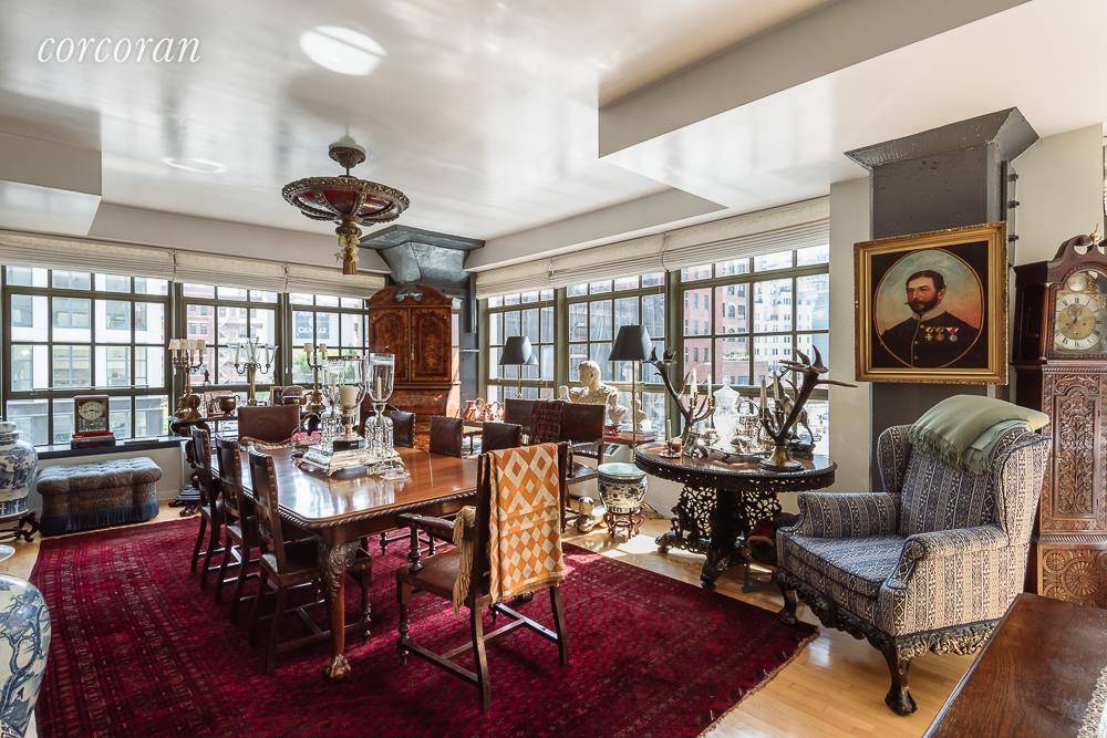 Perfectly perched over the corner of North Moore Street and Varick Street, this expansive 2 3 bedroom and 2.