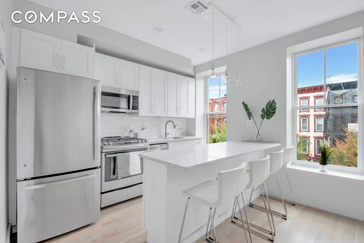 VIRTUAL TOUR AVAILABLE ! A brownstone condominium is the best way to enjoy the merge of classic style and modern convenience.
