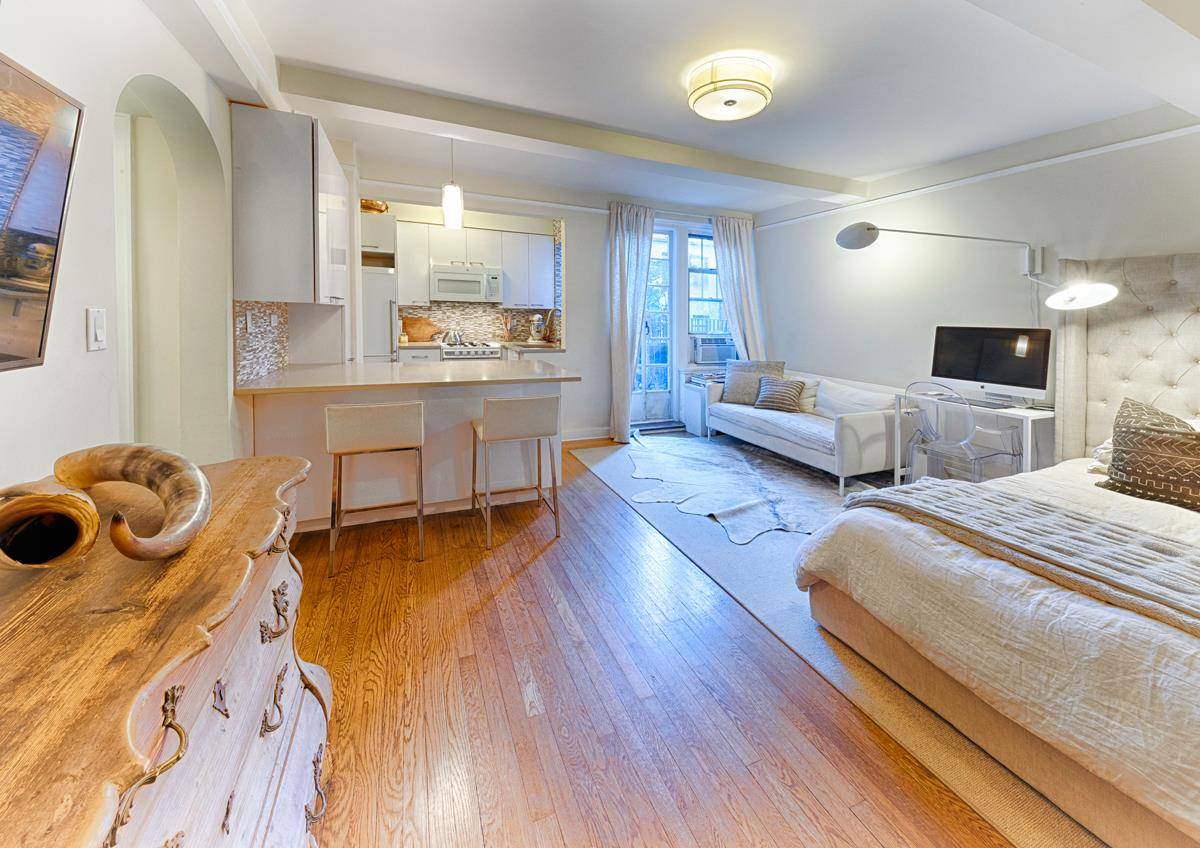 One of a kind studio with private outdoor space in the highly coveted pre war condominium 299 West 12th Street.