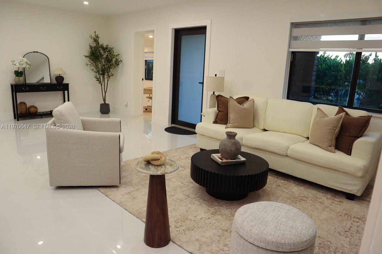 Spacious corner lot residence offering 4 bedrooms, 4 full bathrooms plus a half bath, including multiple ensuite bedrooms and a dedicated office space.