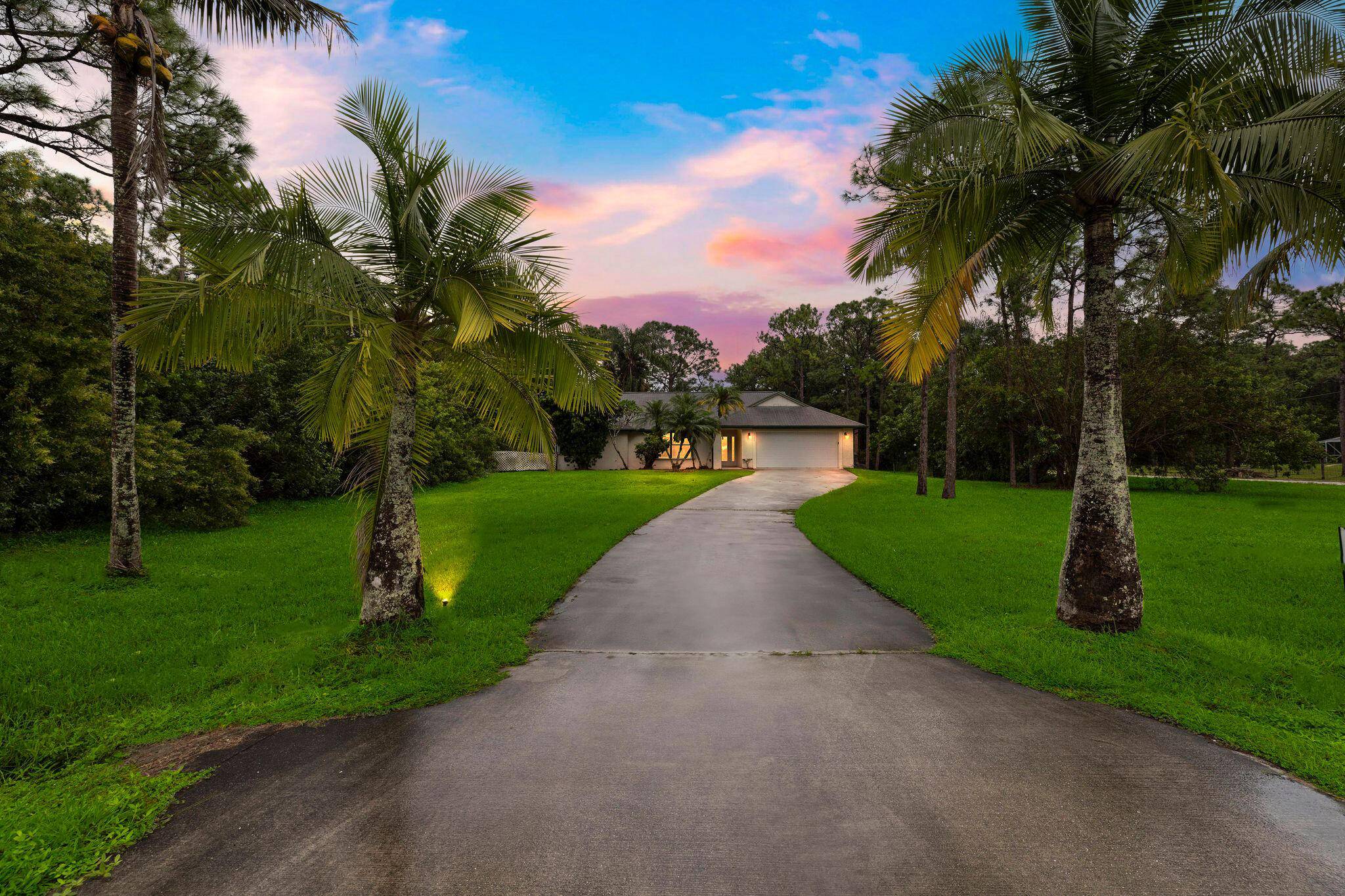 Welcome to your dream home in the heart of Jupiter Farms !