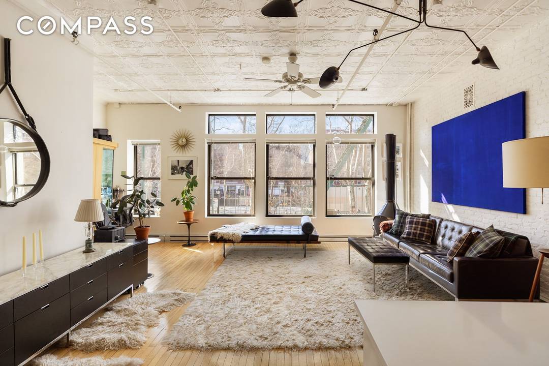 Loft 2F at 84 Forsyth Street is a one bedroom, one and a half bathroom master class in authentic downtown loft life.