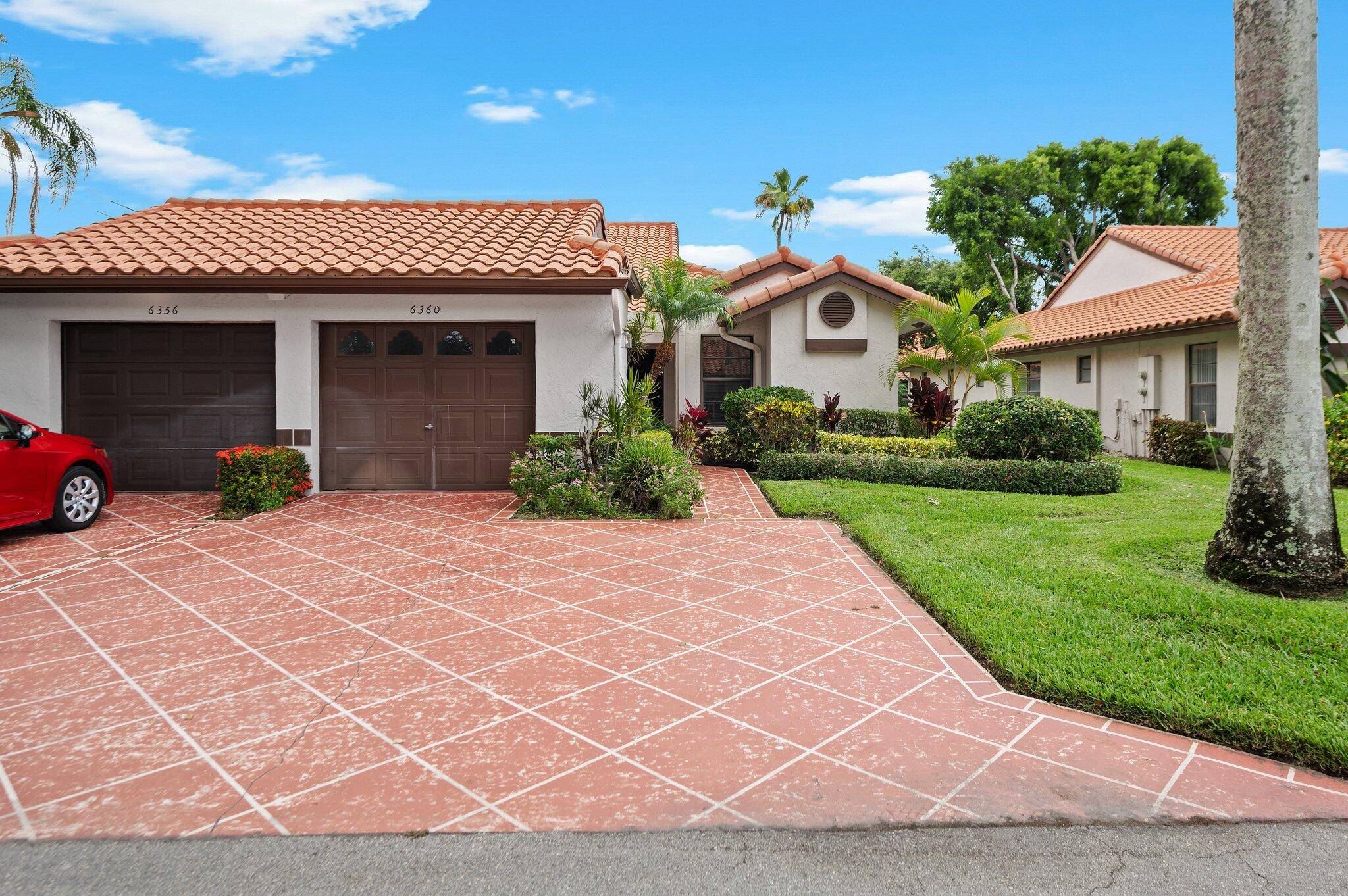 OWN THE BEST PRICED MONACO VILLA IN HUNTINGTON POINTE !