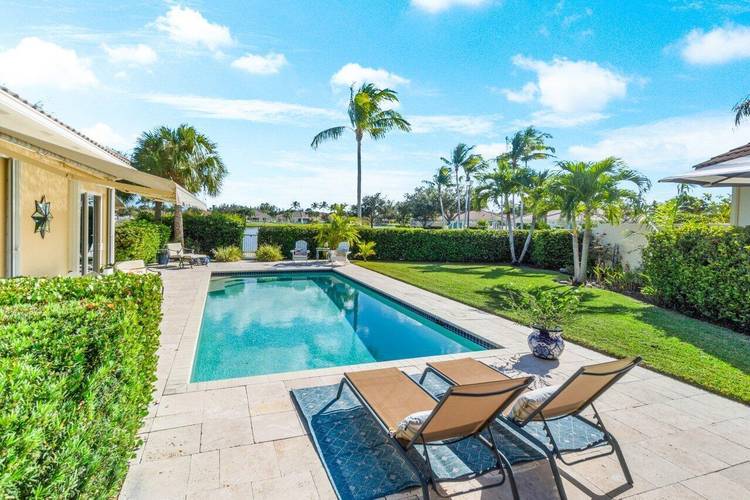 This exquisite home, w 24 hour manned security gated community of Villagewalk, is nestled at the end of a cul de sac for max privacy.